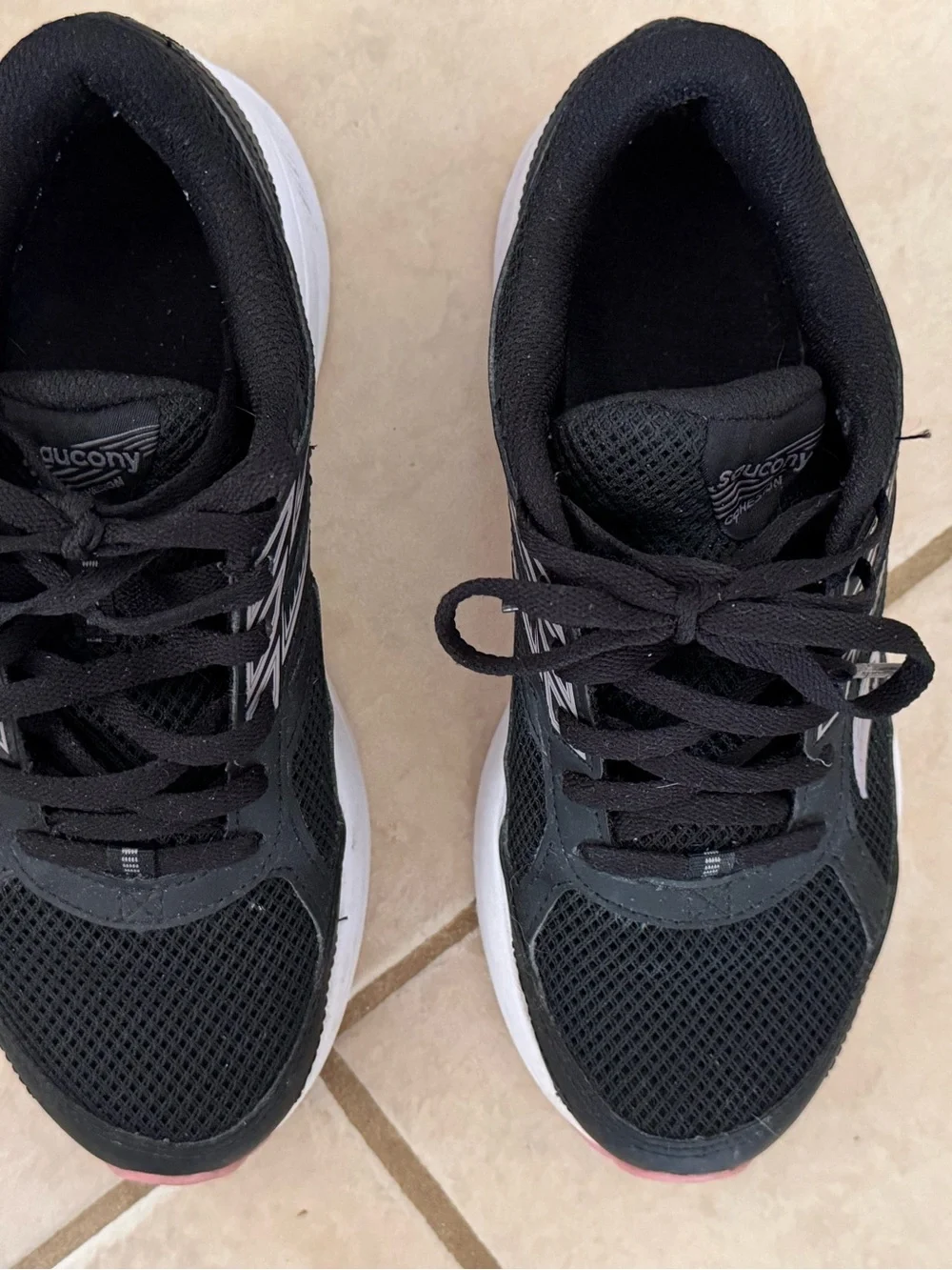 Saucony Women's Cohesion Running Sneakers in Black and Light Pink